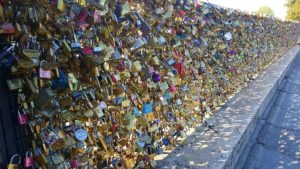 PHOTO COURTESY Kali Wells | Countless “love locks” commemorating couples adorn a bridge in the city of love. 