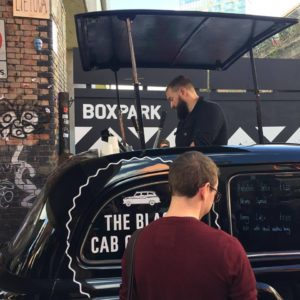 PHOTO COURTESY Elizabeth Wellmann | Coffee is served from the sunroof of a cab in Brick Lane.