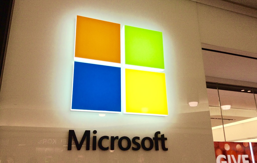 A picture of microsofts multicolored squares logo in a mall